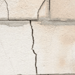 Wall crack highlighting structural damage, emphasizing the need for timely intervention and professional assessment to maintain building integrity.