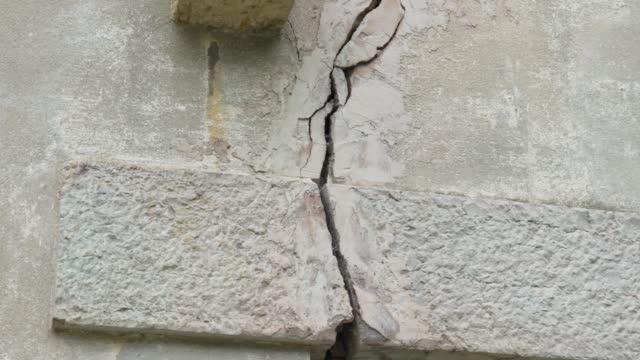 Large vertical crack in exterior concrete foundation wall