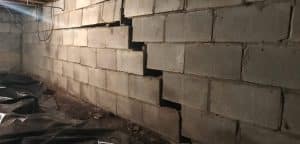 Horizontal foundation crack repair needed on a bowed concrete block basement wall